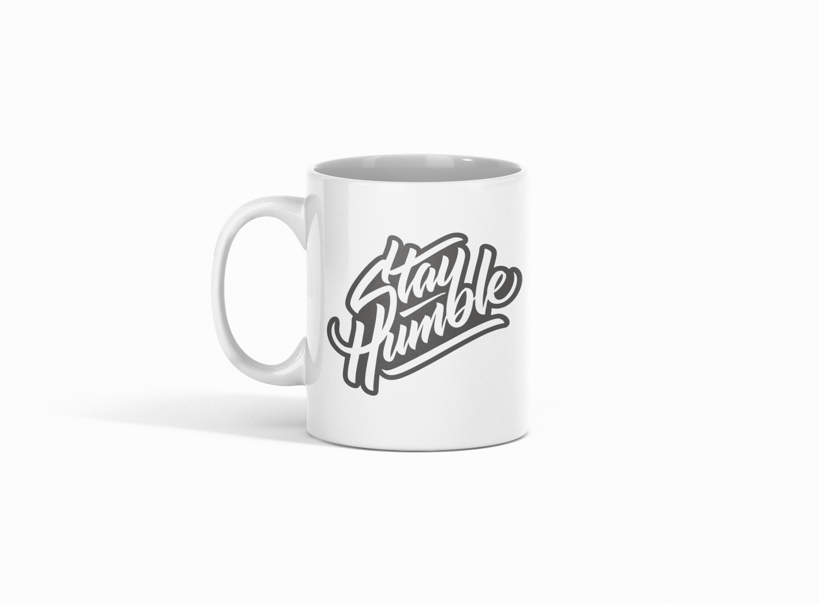 Premium White Coffee Mug featuring "Stay Humble" italic text.