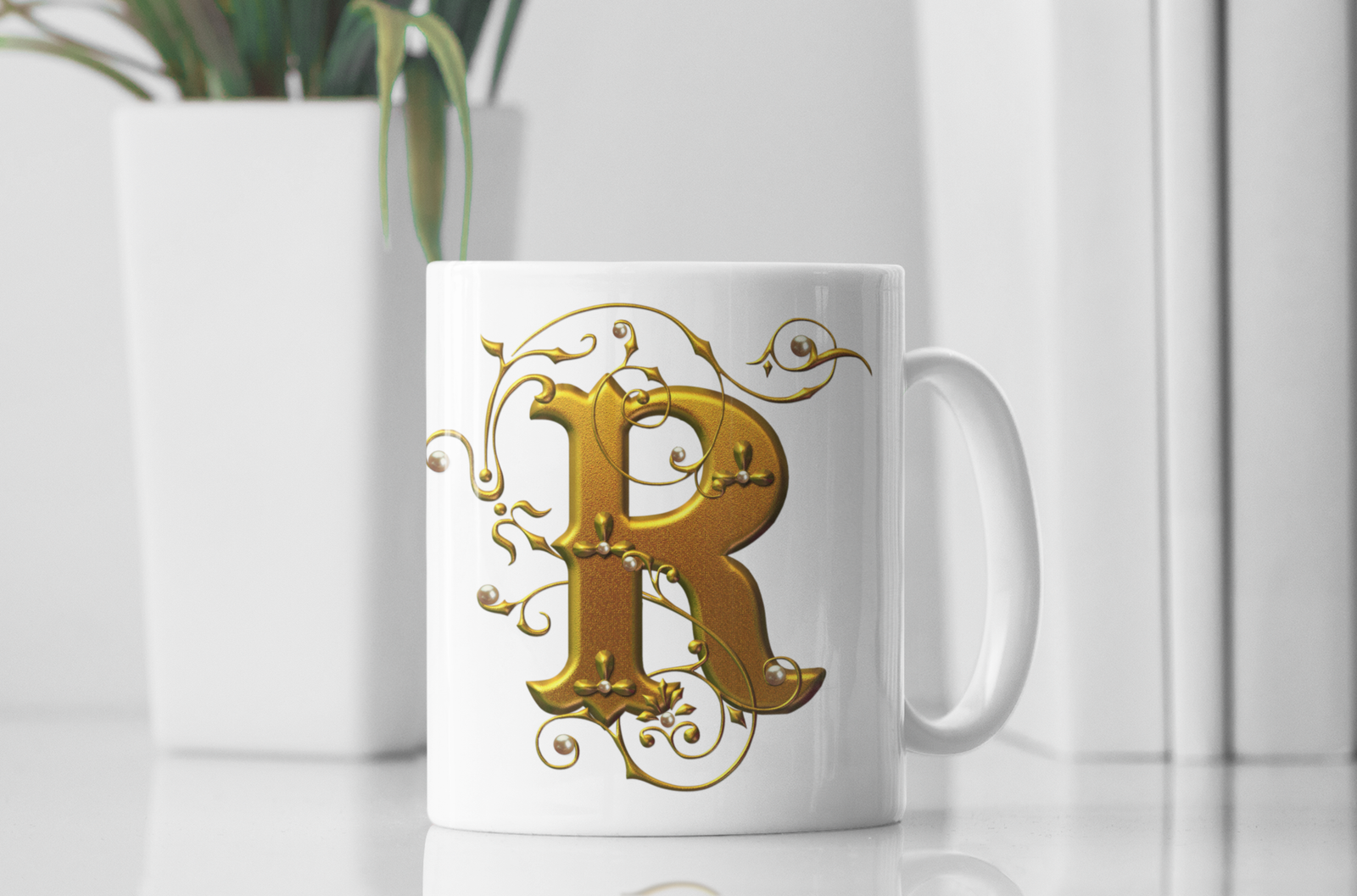 premium white coffee mug featuring a luxurious Designer "R" in golden gradient text