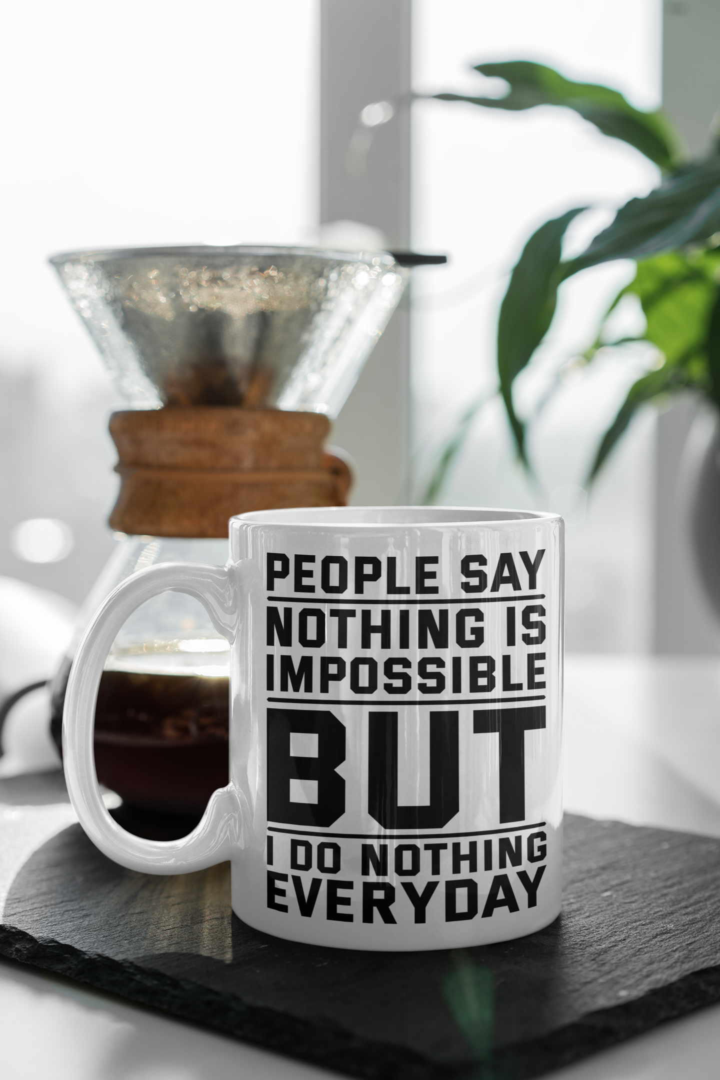 White Coffee Mug – "People Say Nothing is Impossible, But I Do Nothing Every Day"